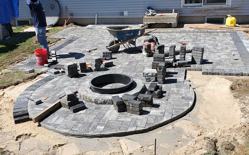 An expertly built fire pit by Affordable Patio, ensuring safety, durability, and efficient heat distribution