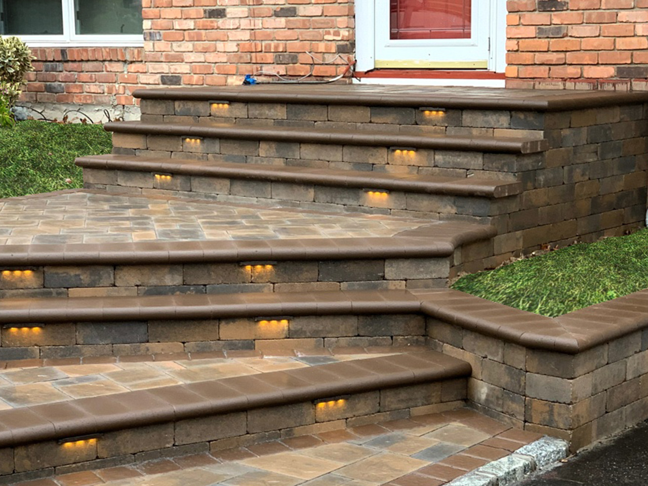Natural stone steps that seamlessly blend with surrounding gardens and landscaped areas