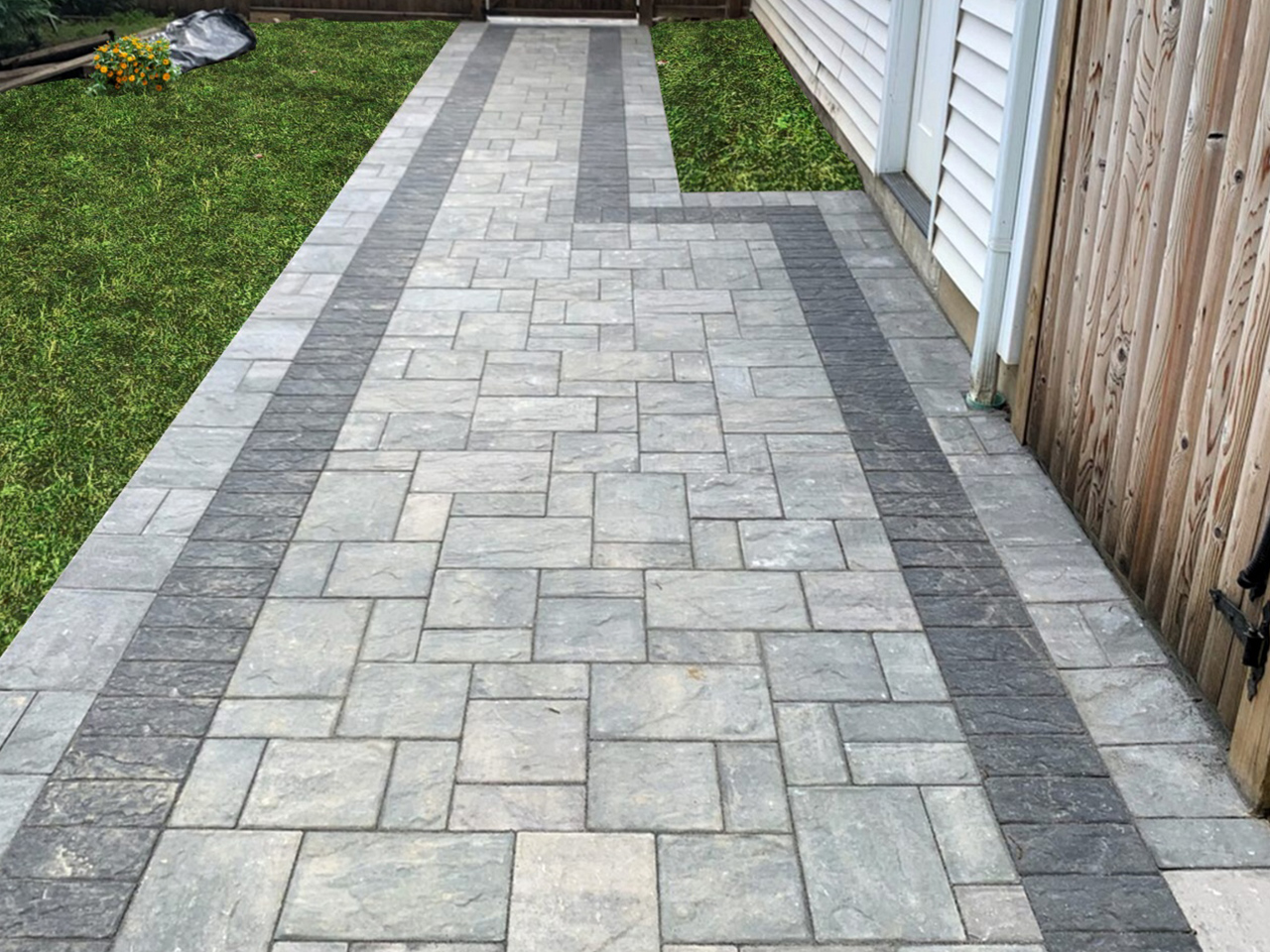 paver walkway installation. A beautifully designed walkway by Affordable Patio, featuring a combination of pavers and natural stone