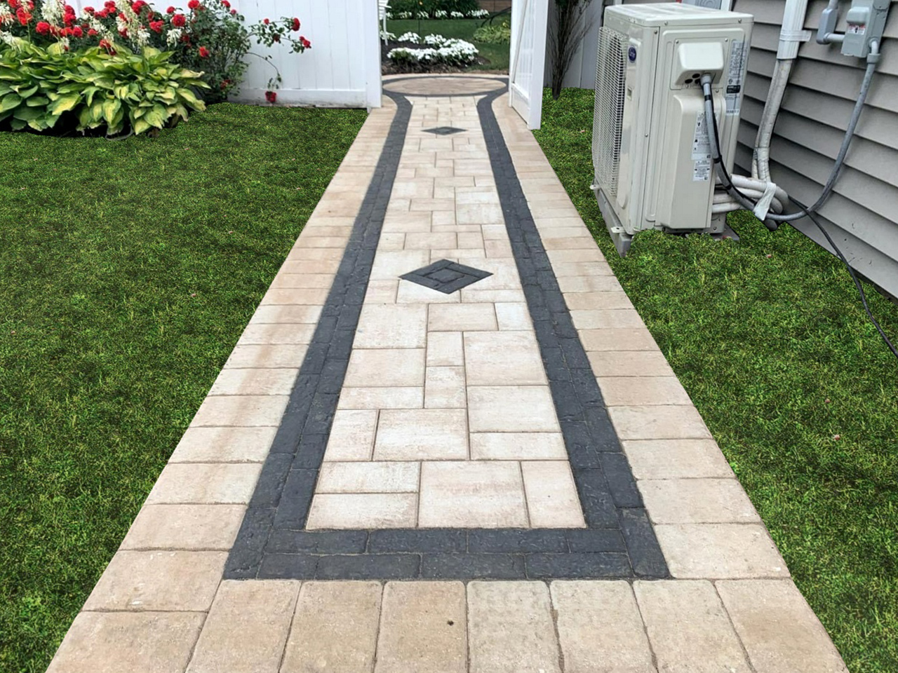 paver walkway installation. An elegantly designed walkway in a patio, showcasing Affordable Patio's attention to detail and craftsmanship
