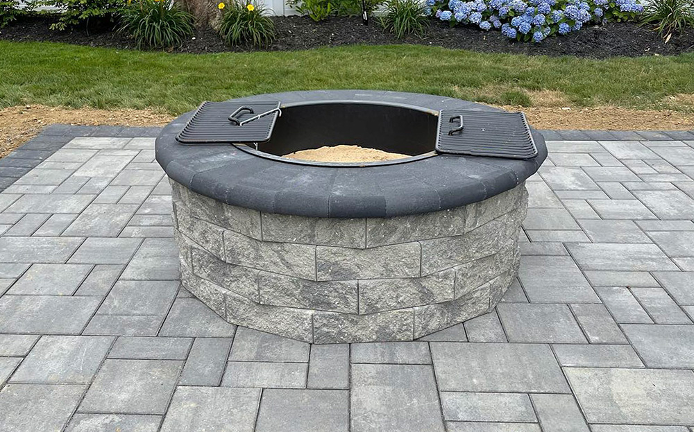 A professionally executed fire pit project by Affordable Patio, adding a touch of warmth and charm to the outdoor setting
