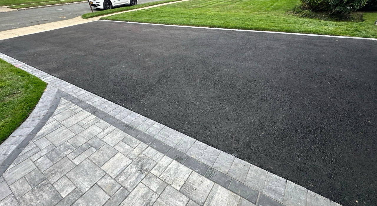 Close-up of interlocking stones and professional masonry, providing a clear example of the driveway paver cost on Long Island.