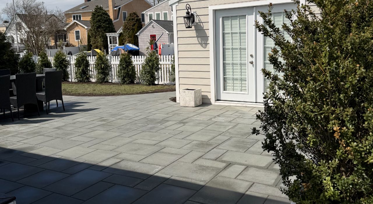 backyard plan for an outdoor kitchen installation with BBQ island foundation and paver patio integration