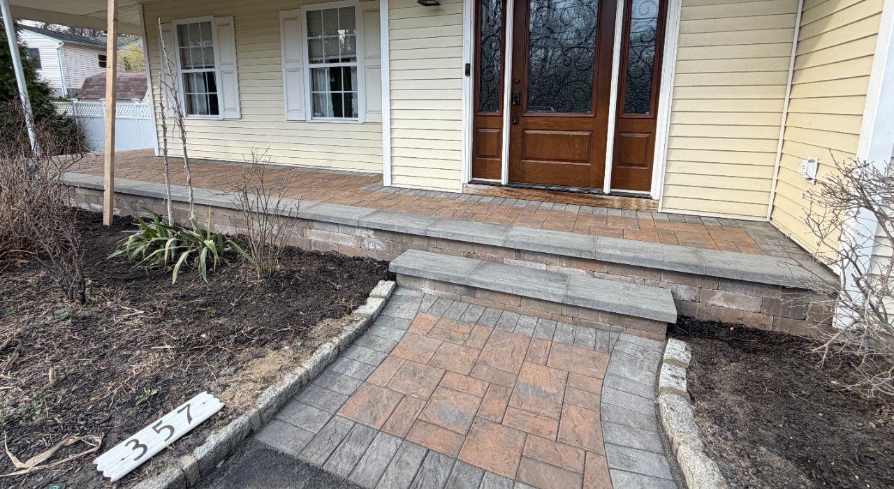 Paver patio installation with patio layout, base prep, and access path in a Suffolk County yard