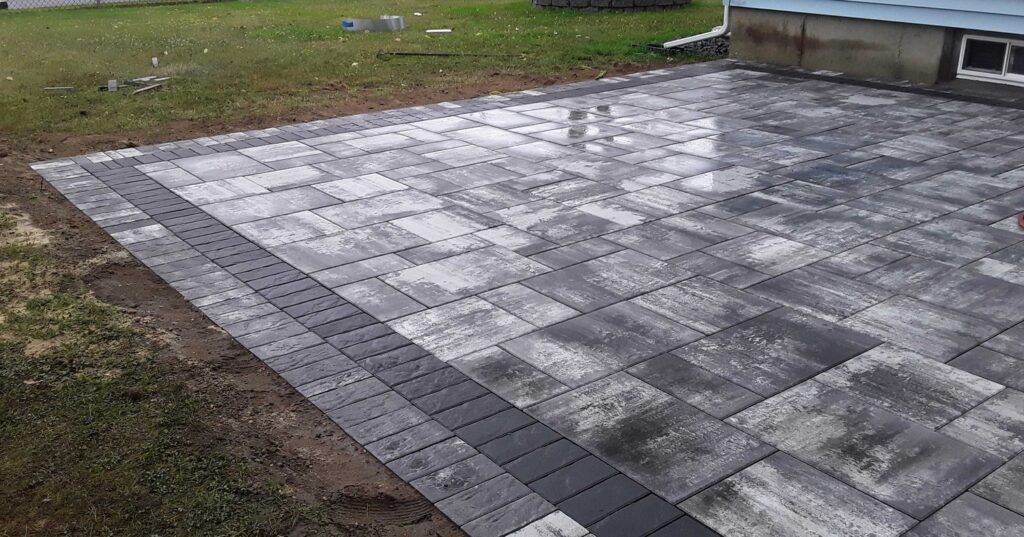 A luxury oceanfront pool deck featuring winter patio care on Long Island