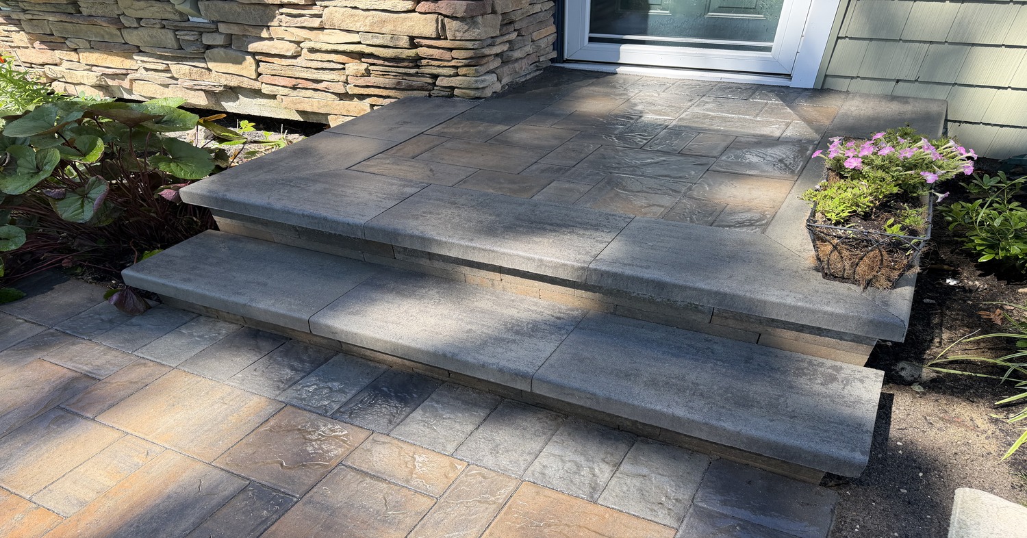 Custom outdoor entry stairs highlighting granite steps vs bluestone steps in Dover.